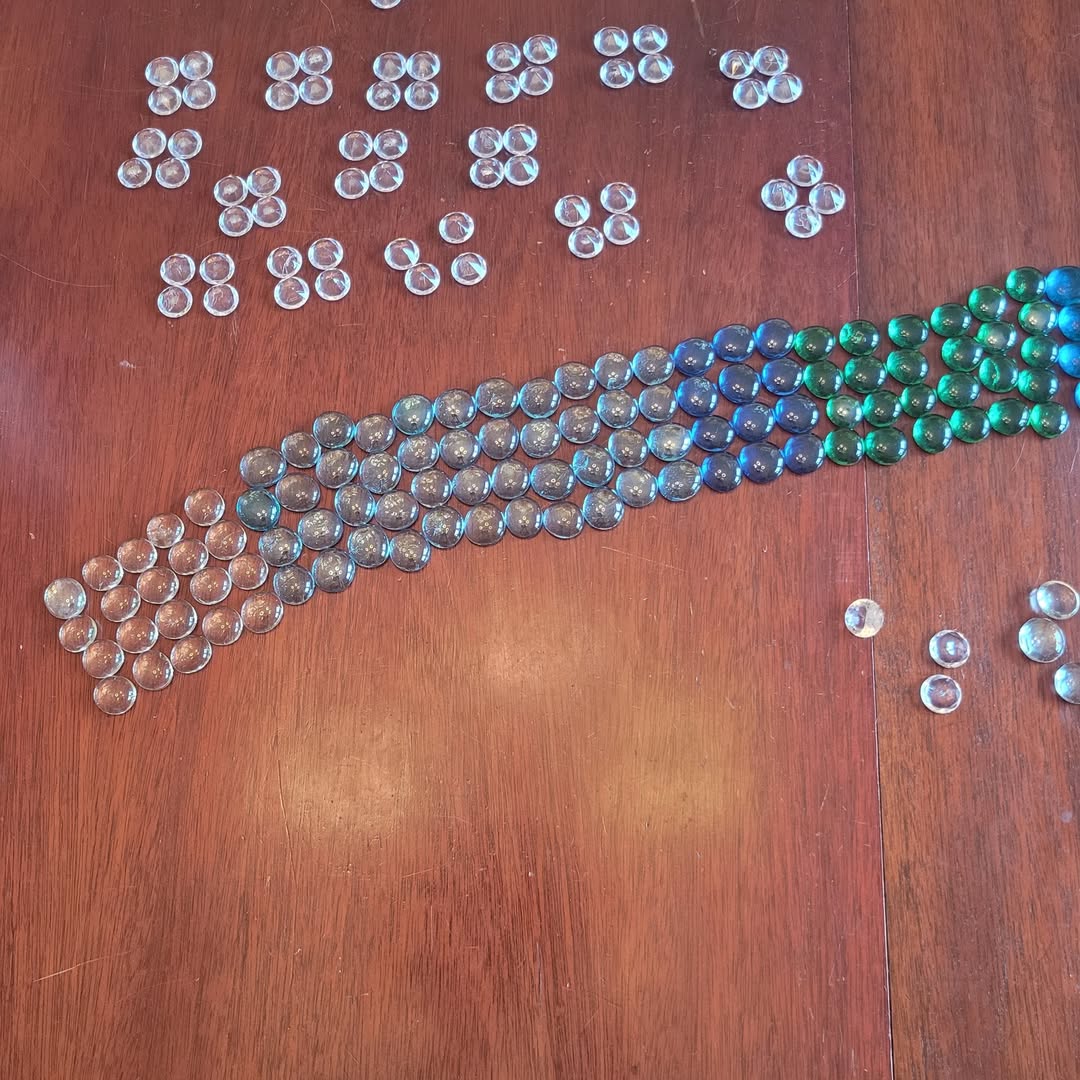 Glass gems arranged on a table for a math lesson